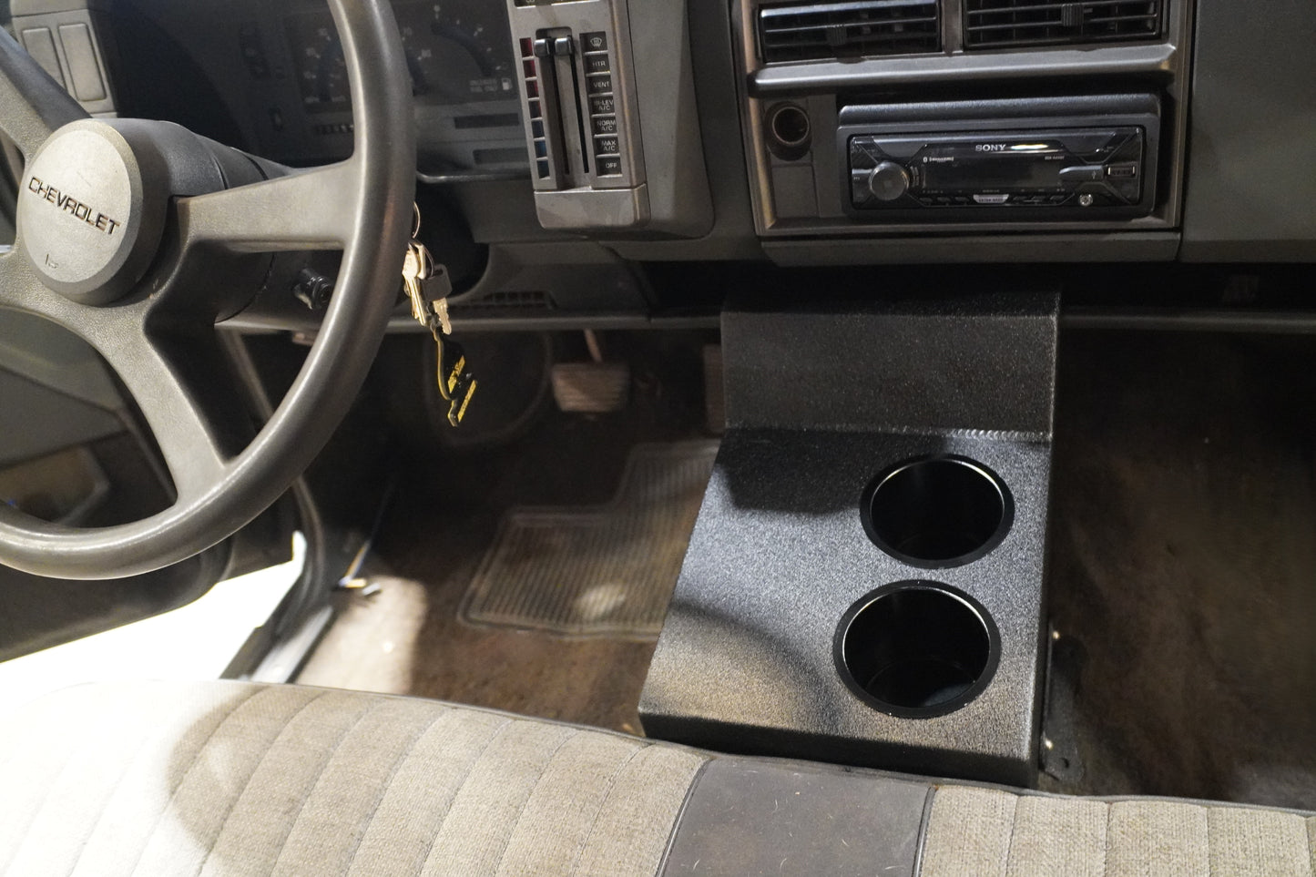 First generation s-10 center console. With cup holders.